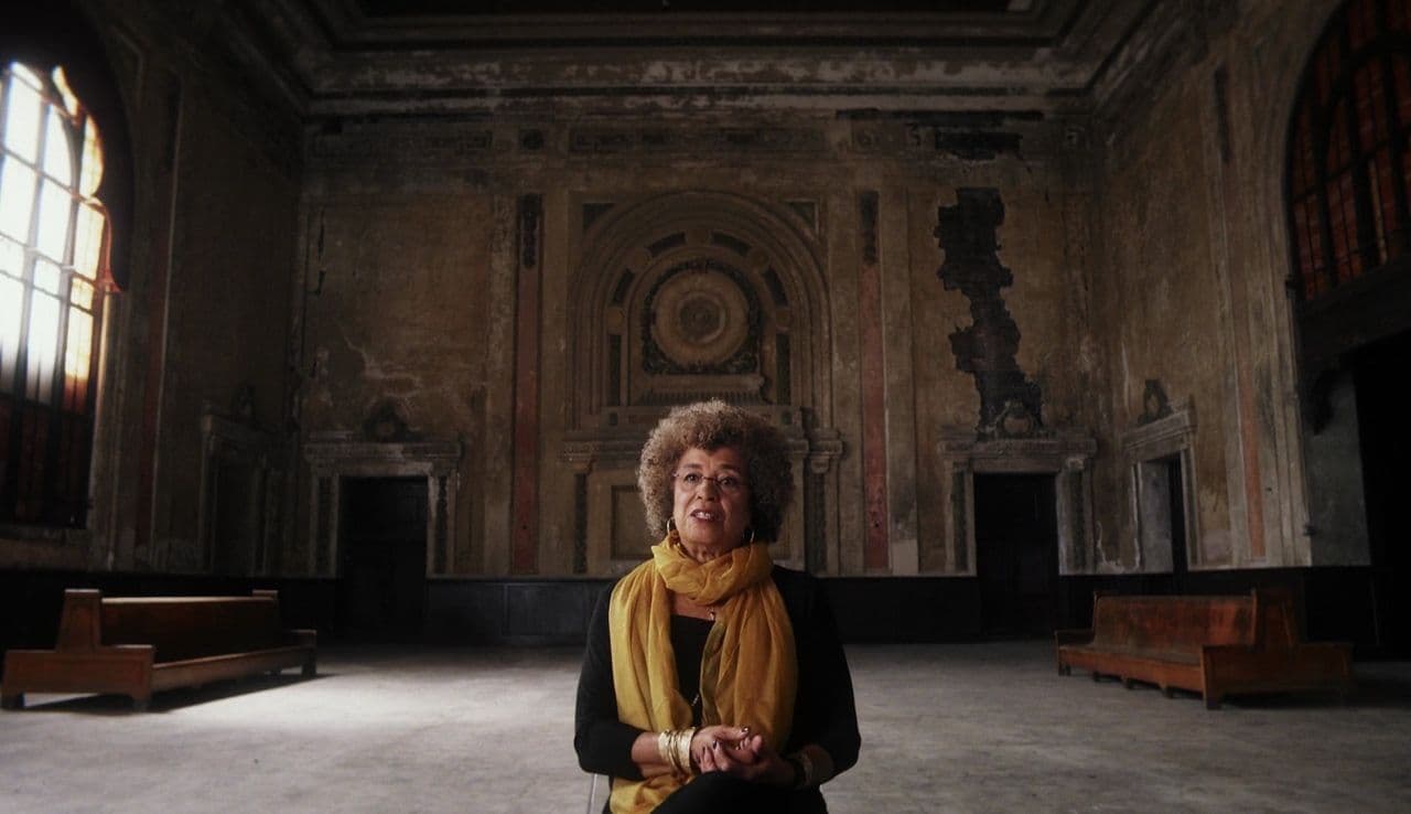 Angela Davis speaking in a still from the documentary 13TH.